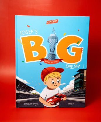 Book cover of 'Josef's Big Dream' with a child holding a car on a red background