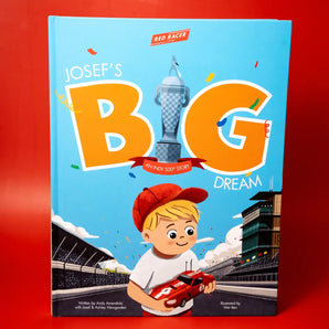 Book cover of 'Josef's Big Dream' with a child holding a car on a red background
